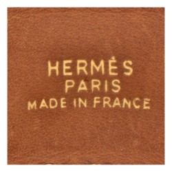 Hermès 'Deux Eperons' bruin lederen armband met een zilveren sluiting uit de jaren 1950.