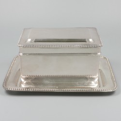 Koektrommel met onderschotel zilver.