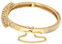 20 kt. Geelgouden bangle armband bezet met ca. 3.69 ct. champagne- en cognackleurige diamanten.