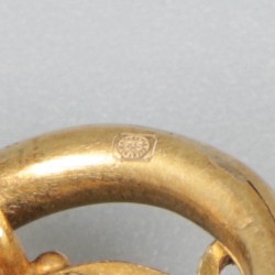14 kt. Geelgouden corpus / borstkruis met peridot.