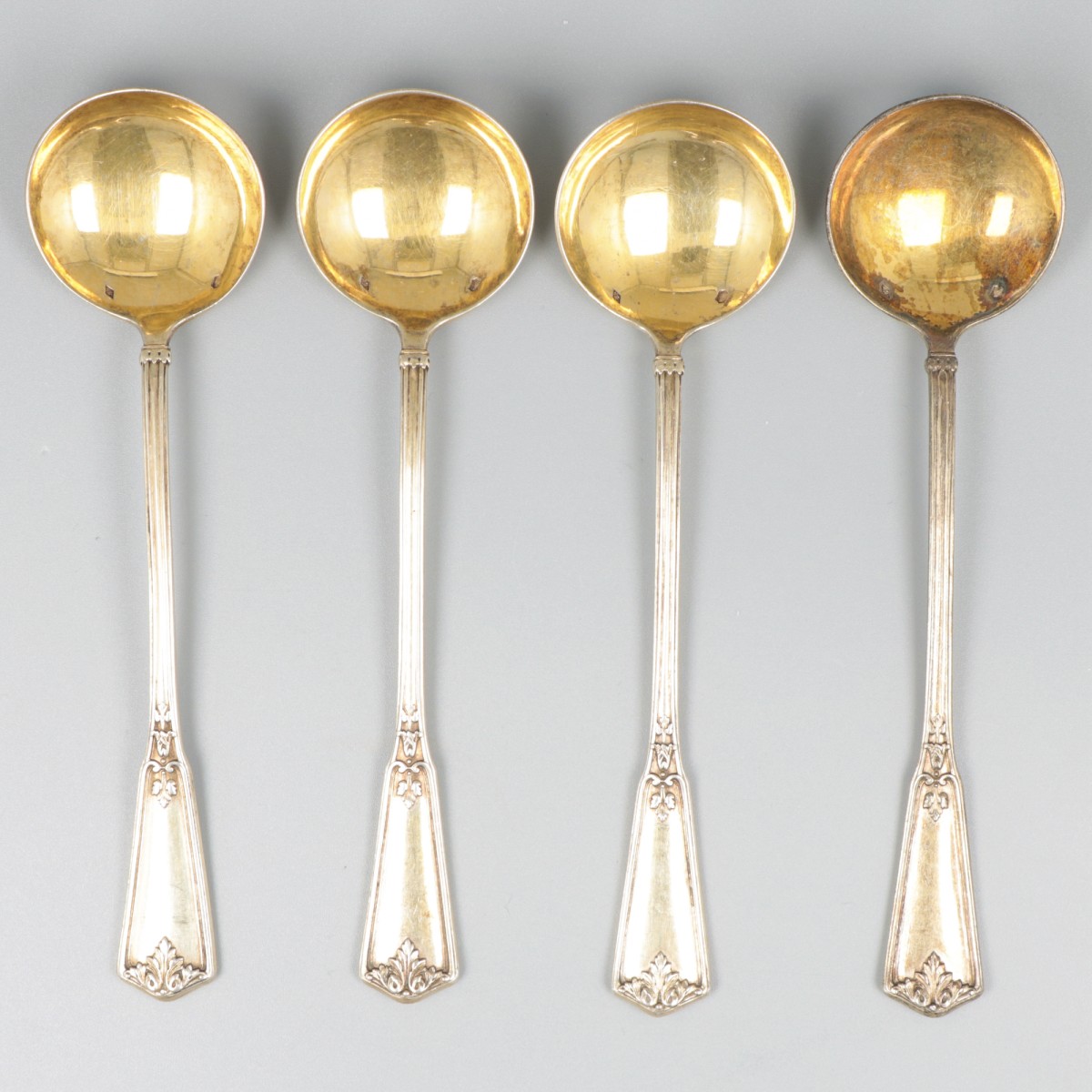 4-delig lot puddinglepels zilver.