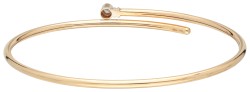 14 kt. Geelgouden bangle armband bezet met een diamant.