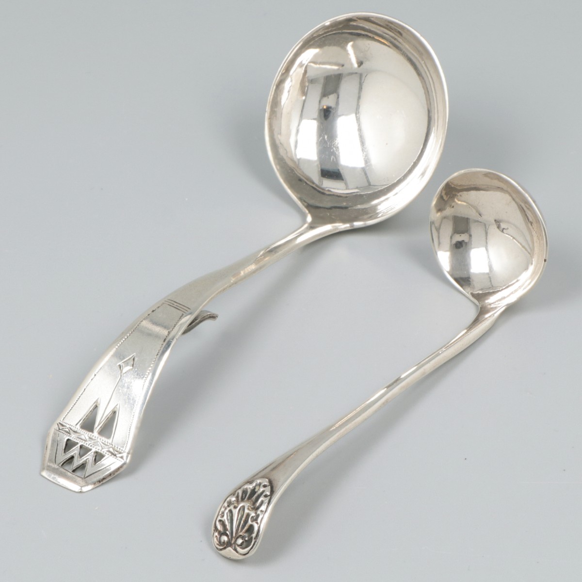 Room- en zoutlepel zilver.