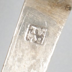 Rammelaar zilver.