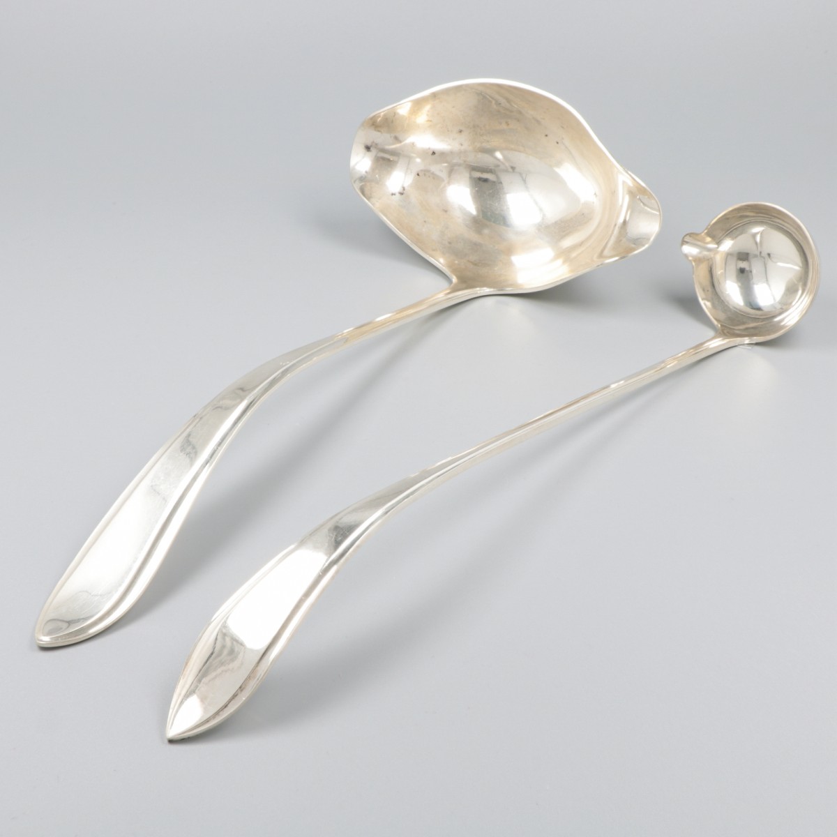 Soeplouche en bowllepel zilver.