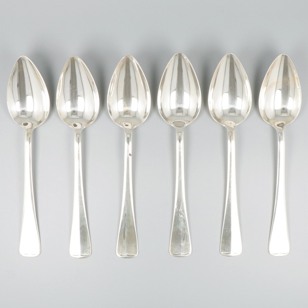 6-delige set dinerlepels Haags lofje zilver.