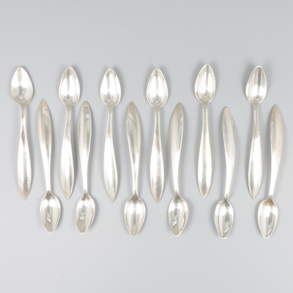 12-delige set mokkalepeltjes zilver.