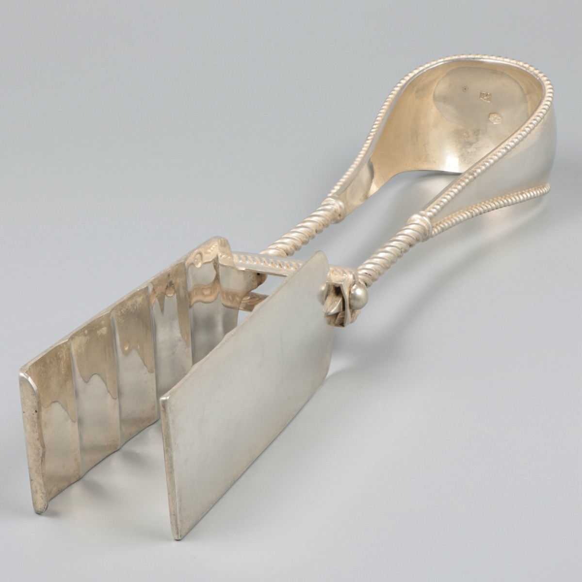 Aspergetang zilver.