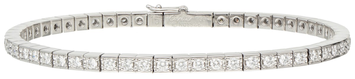 Cartier 'Lanières' 18 kt. witgouden tennisarmband bezet met ca. 1.68 ct. diamant.