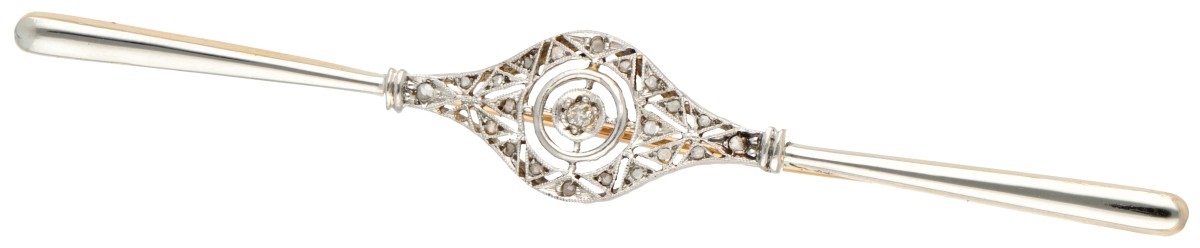 18 kt. Bicolor gouden vroege art deco broche bezet met diamant.