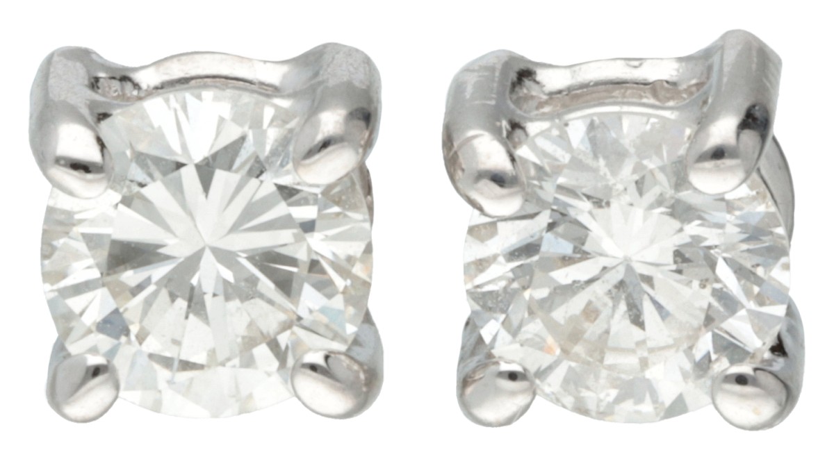 14K Witgouden solitair oorstekers bezet met ca. 2 x 0.35 ct. diamant.