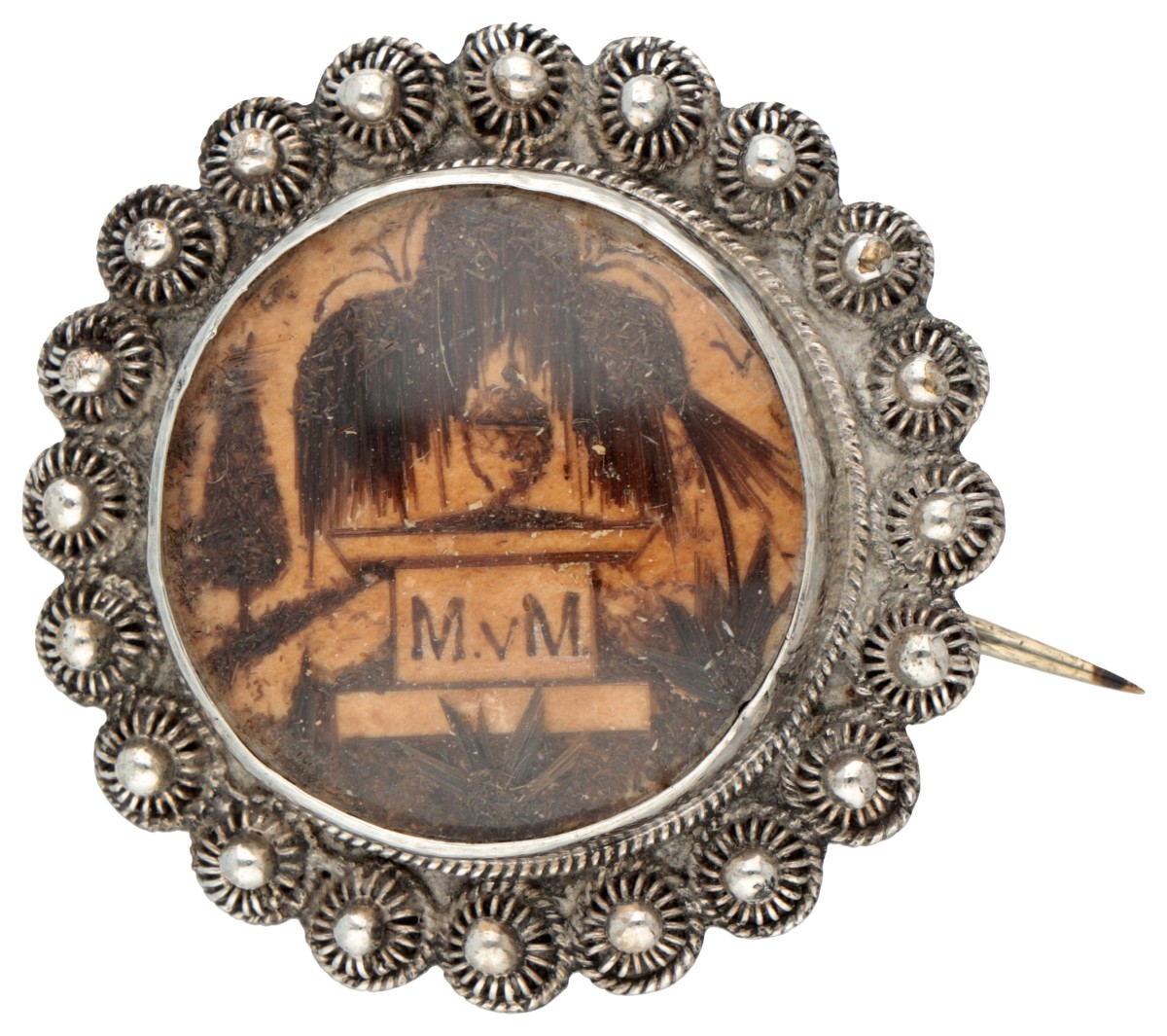 Antieke zilveren herinneringsbroche met haar.
