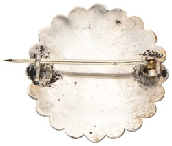 Antieke zilveren herinneringsbroche met haar.