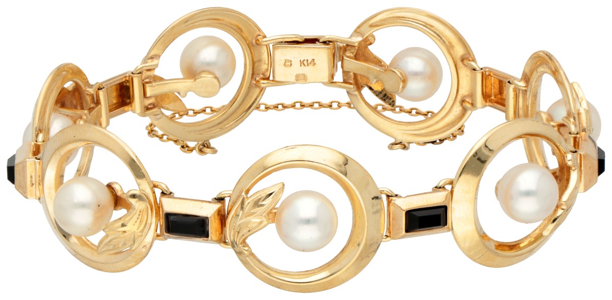18K Geelgouden schakelarmband met parel en onyx.