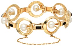 18K Geelgouden schakelarmband met parel en onyx.