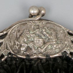 Beugeltas zilver.