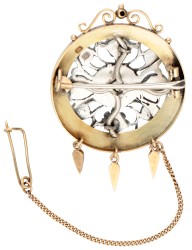 Samengestelde broche van antiek zilveren kruis met diamant in 14K geelgouden rand met pampels.