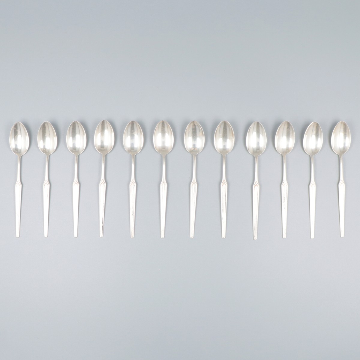 12-delige set koffielepels zilver.