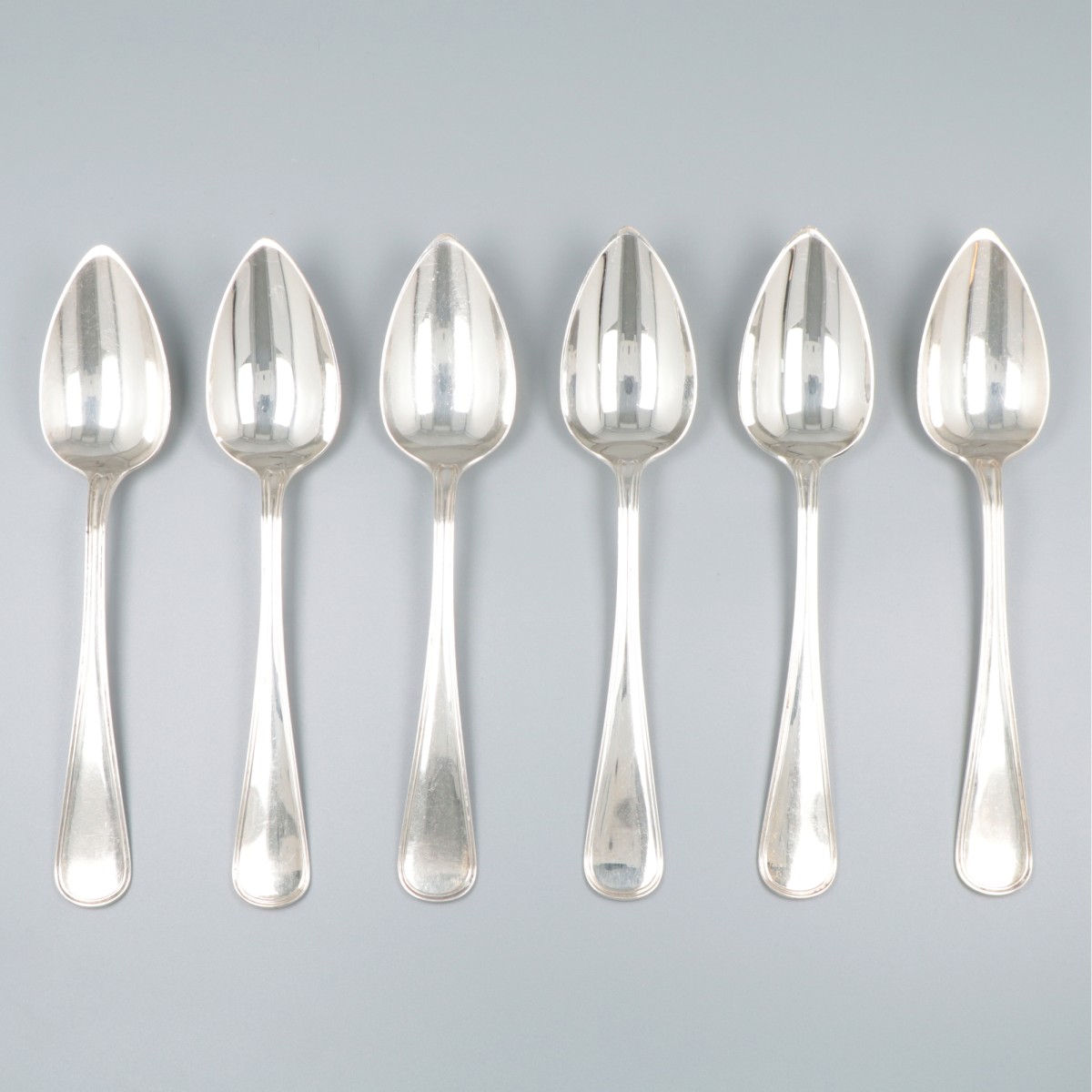 6-delige set dinerlepels zilver.