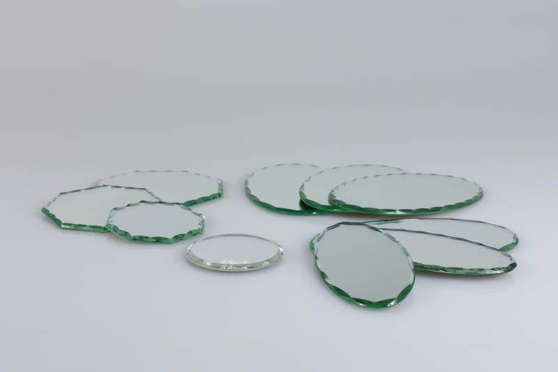 Een lot diverse Swarovski onderzetters, spiegelglas, 20e eeuw. 