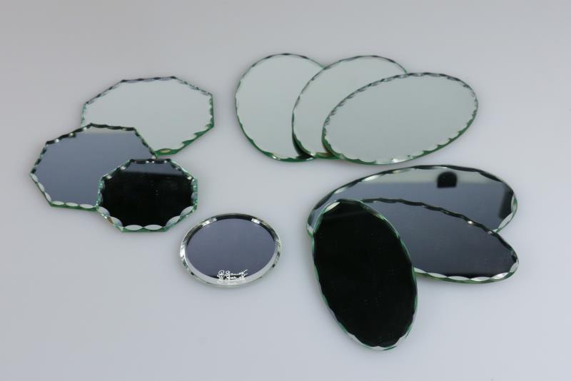 Een lot diverse Swarovski onderzetters, spiegelglas, 20e eeuw. 