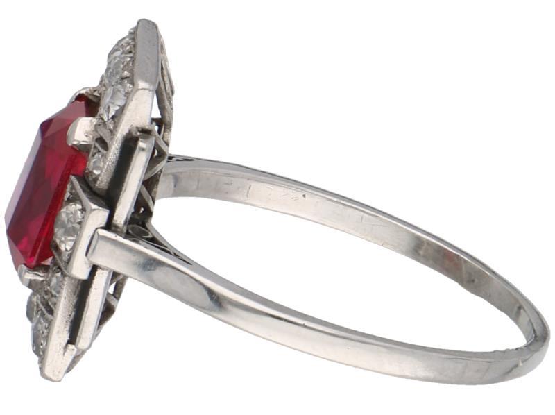 Witgouden ring, ca. 0.36 ct. diamant, robijn en onyx - 14 kt.