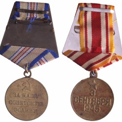 Russia. Soviet Union. 1945. Lot (2) medal 'Defense of the Caucasus' and a medal 'For victory over Japan', both with bifold ribbon.