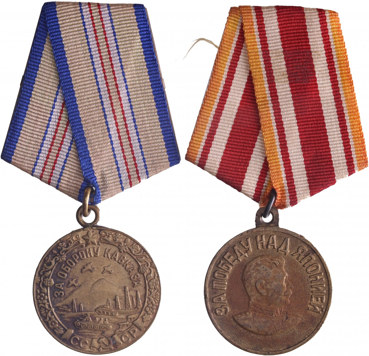 Russia. Soviet Union. 1945. Lot (2) medal 'Defense of the Caucasus' and a medal 'For victory over Japan', both with bifold ribbon.