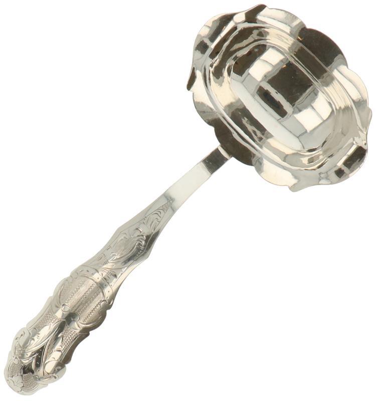 Silver ladle.