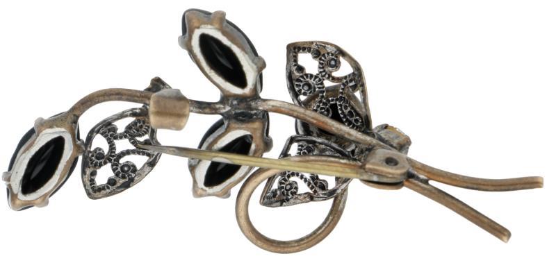 Malinese broche, onyx en zirkonia.