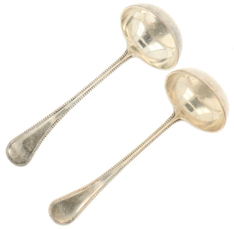 (2) Sauslepels zilver.