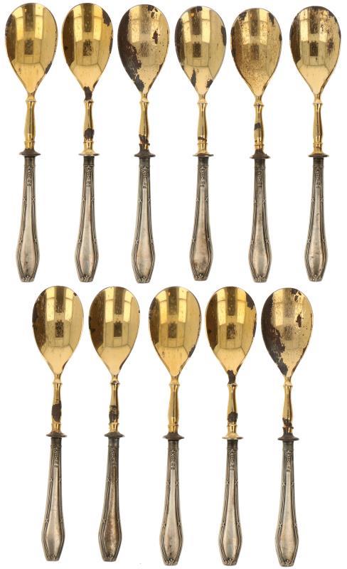 (11) Delige set dessert lepels zilver.