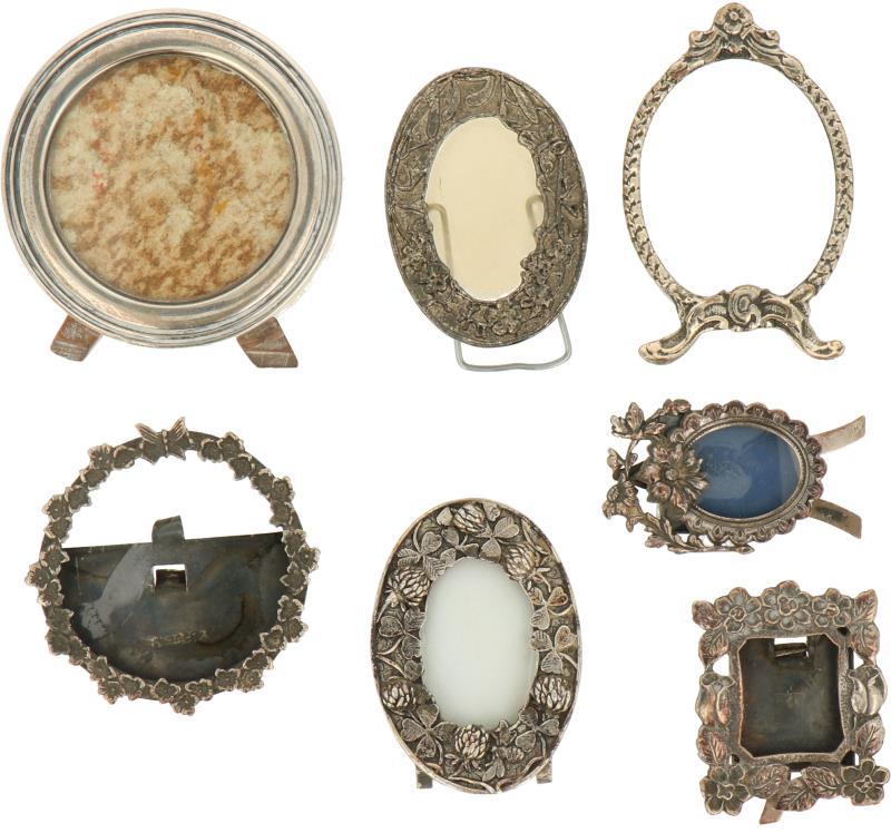 (7) Delig lot Fotolijstjes zilver.