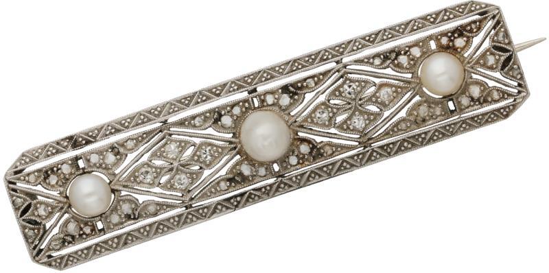 Broche witgoud, ca. 0.25 ct. diamant en parel - 14 kt.