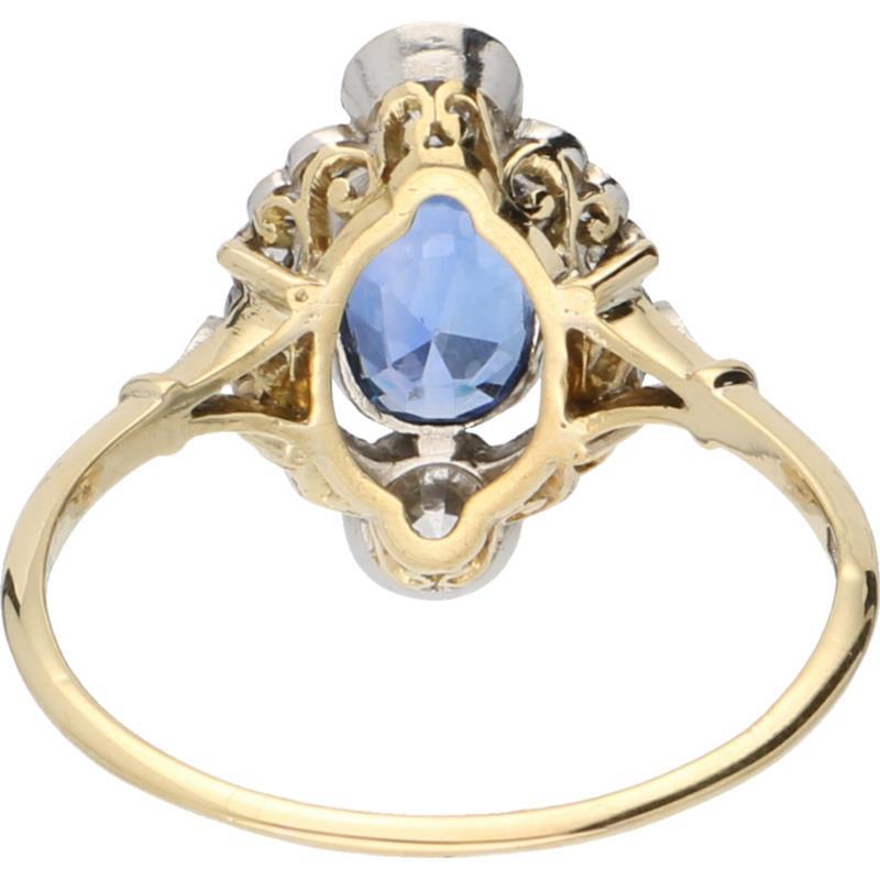 Entourage ring geelgoud, ca. 0.65 ct. diamant en saffier - 14 kt. en Pt 950.