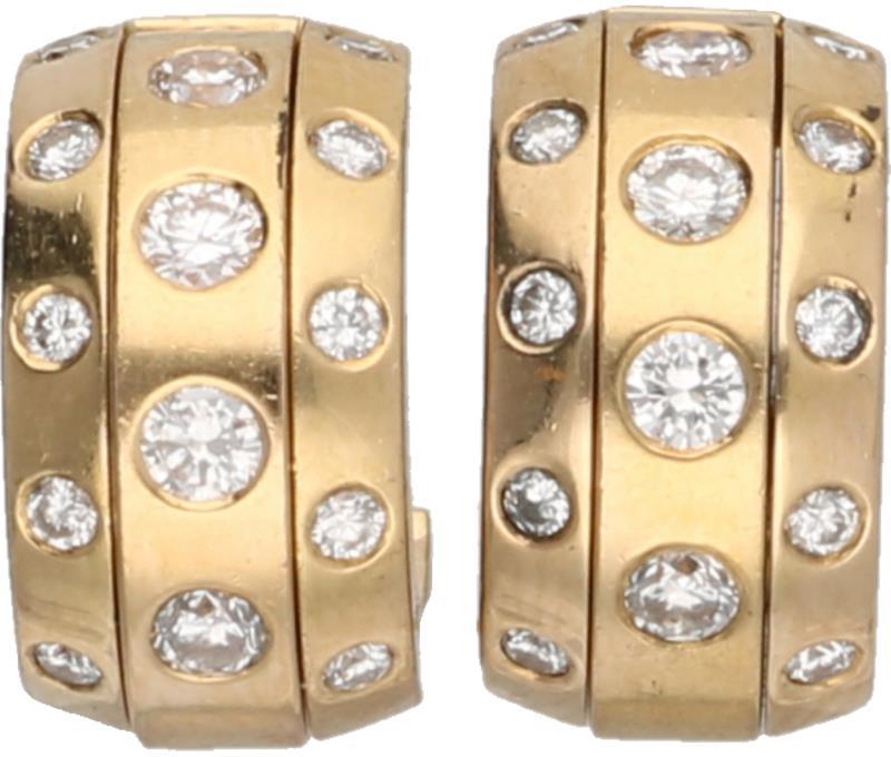 Paul Simons oorbellen geelgoud, ca. 0.34 ct. diamant - 18 kt.