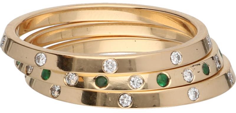 Paul Simons aanschuif ringen geelgoud, ca 0.15 ct. diamant en smaragd - 18 kt.