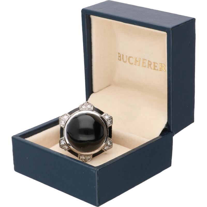 Bucherer cocktailring witgoud, ca. 0.12 ct. diamant en onyx - 18 kt.