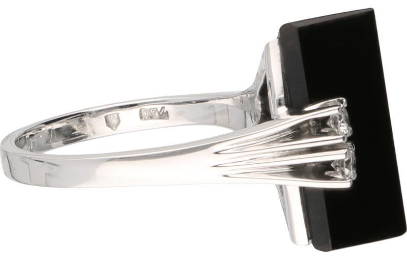 Design ring witgoud, ca. 0.16 ct. diamant en onyx - 18 kt.