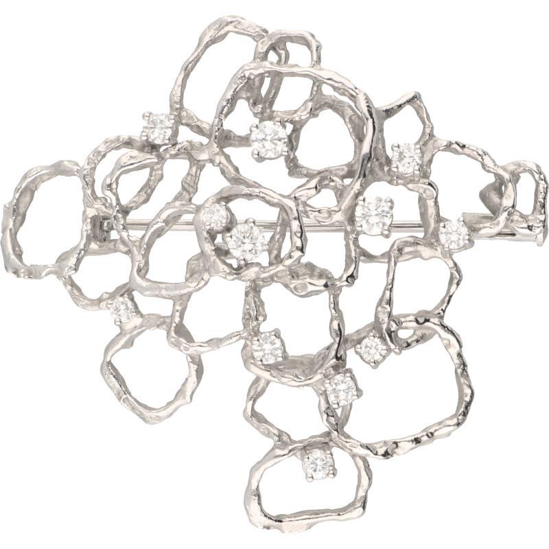 Bucherer broche witgoud, ca. 0.63 ct. diamant - 18 kt.