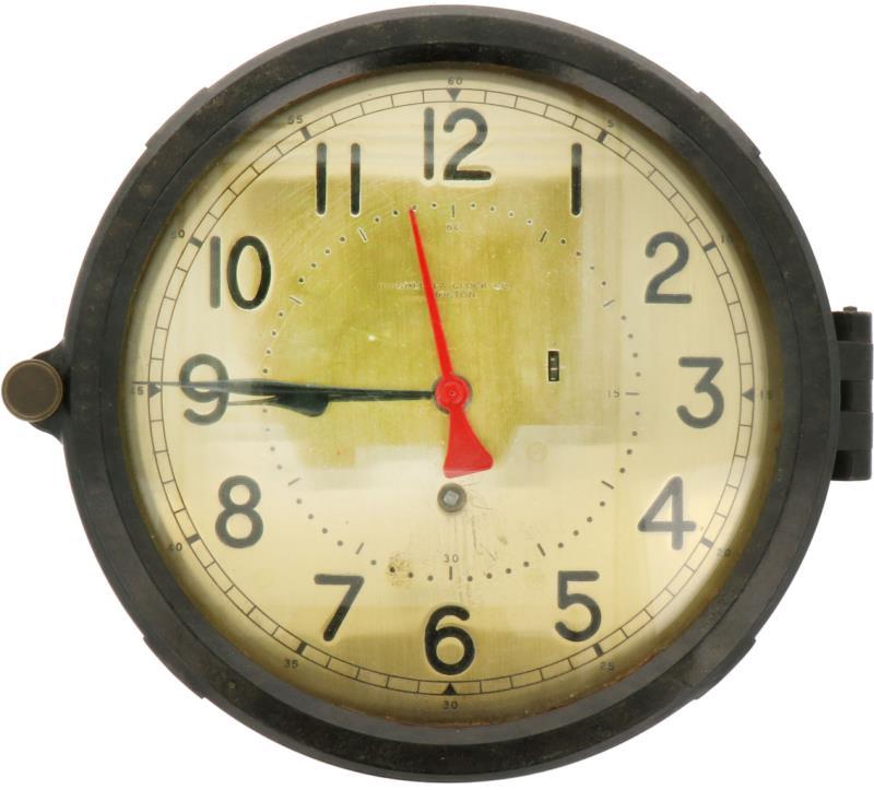 Een Chelsea Clock Co. Boston bakelieten mechanische scheepsklok. Ca. 1930/40. adres op wijzerplaat en nogmaals geadresseerd verso.