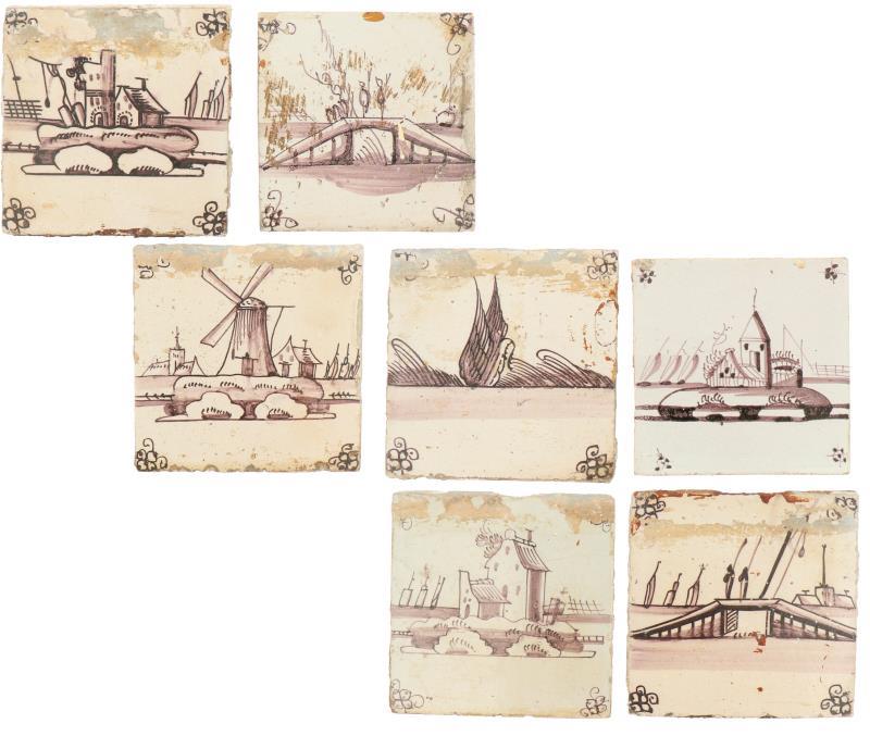 Een lot van zeven aardewerk tegels met landschap decor. Holland 19e eeuw.