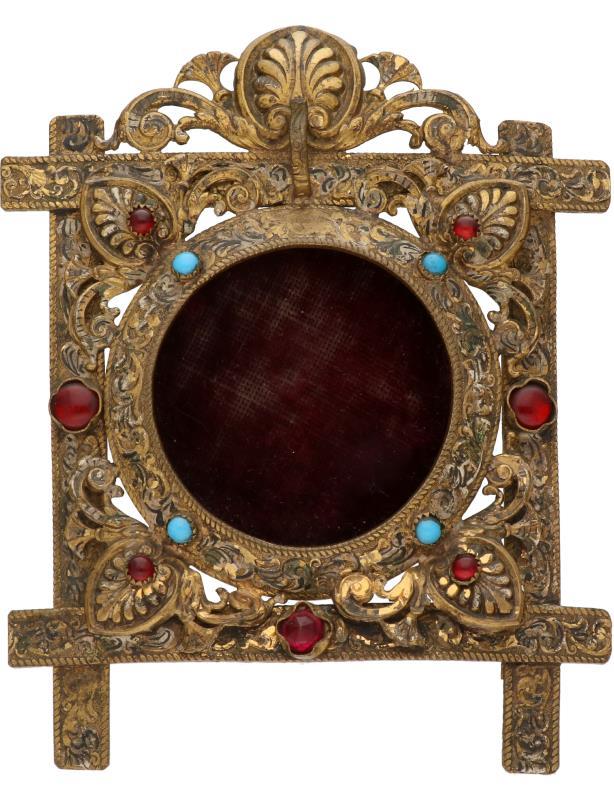 Porte Montre bezet met sierstenen.