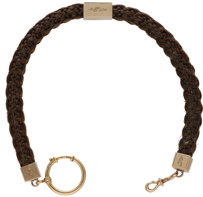 Zakhorloge ketting met geelgouden tussenstukken.