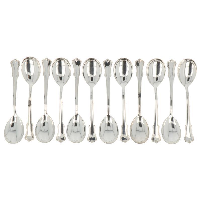 (12) Delige set dessert lepels OKA zilver.
