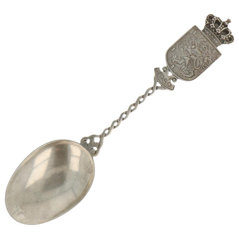 Gelegenheids lepel met gevlochten steel en bekroond wapenschild met nederlandse leeuw zilver.