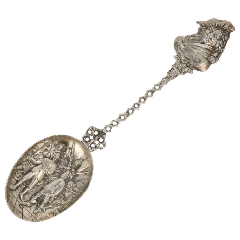 Gelegenheids lepel met gevlochten steel en Rembrandt afgebeeld zilver.
