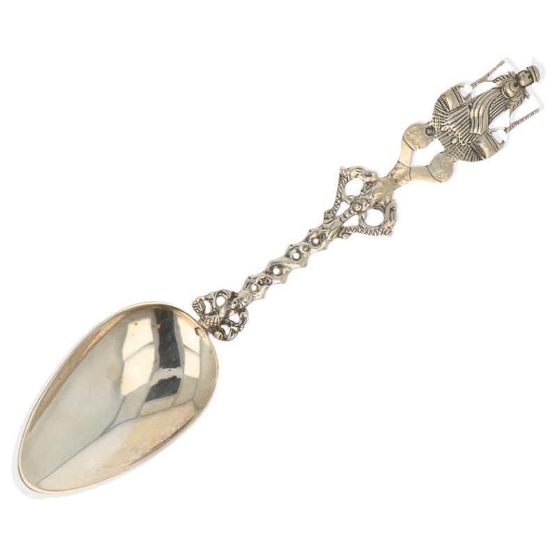Gelegenheids lepel met gevlochten steel, dolfijnen en melkmeisje zilver.