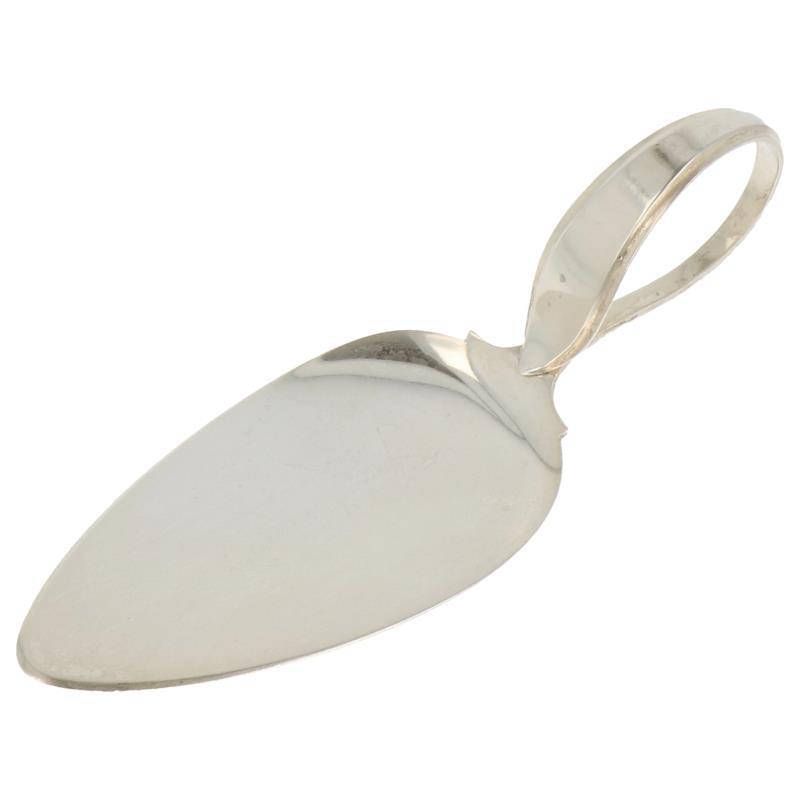 Gebakschep met sierlijk omgeslagen handvat zilver.