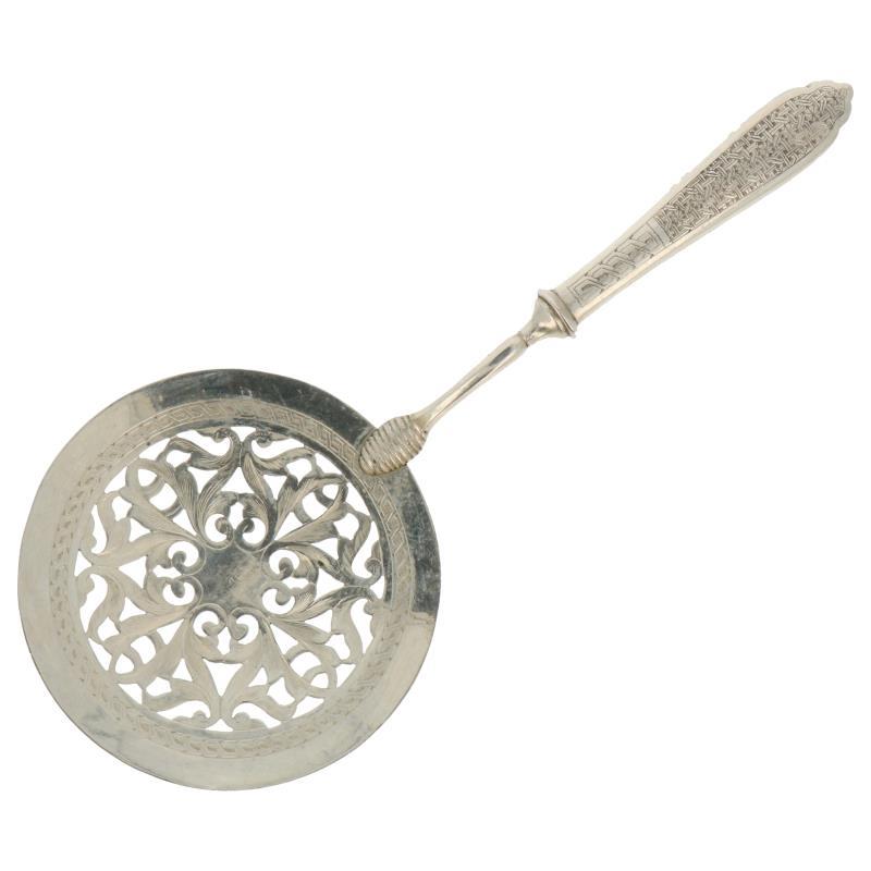 Couscous schep opengewerkte schep met oosterse gegraveerde decoraties zilver.